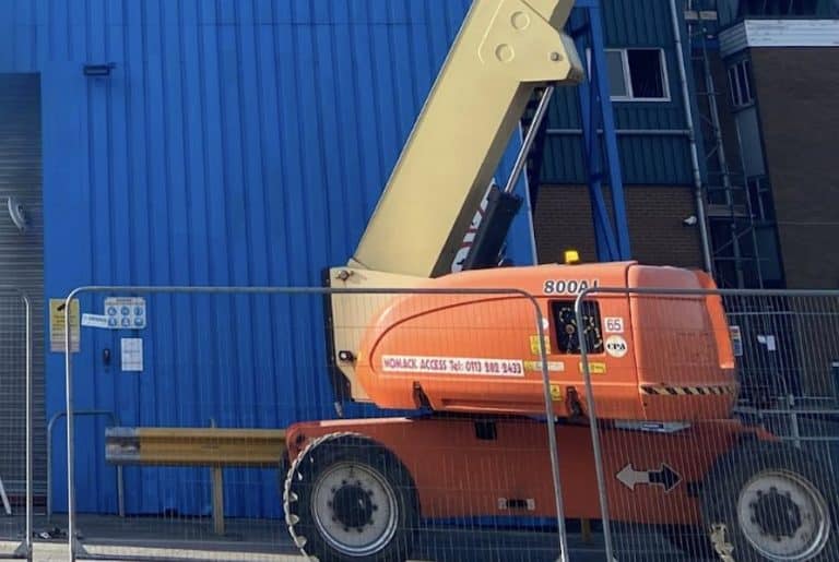 Transform Industrial Buildings with Cherry Picker Painting